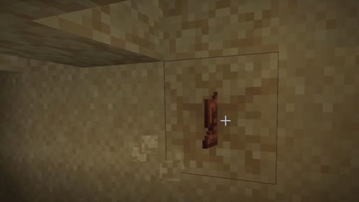 Find Pottery Sherds in Minecraft by brushing suspicious sand and gravel.